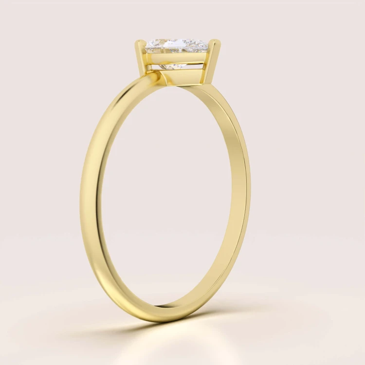 verlobungsring-teardrop-moissanit-0-5ct-birnenschliff-seitenansicht-gelbgold-hariets.jpg