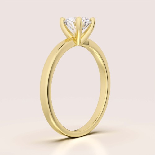 verlobungsring-solitaire-flare-moissanit-0-5ct-brillantschliff-seitenansicht-gelbgold-hariets.jpg