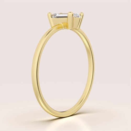 verlobungsring-petit-moissanit-0-5ct-emeraldschliff-seite-gelbgold-finesse-hariets.jpg