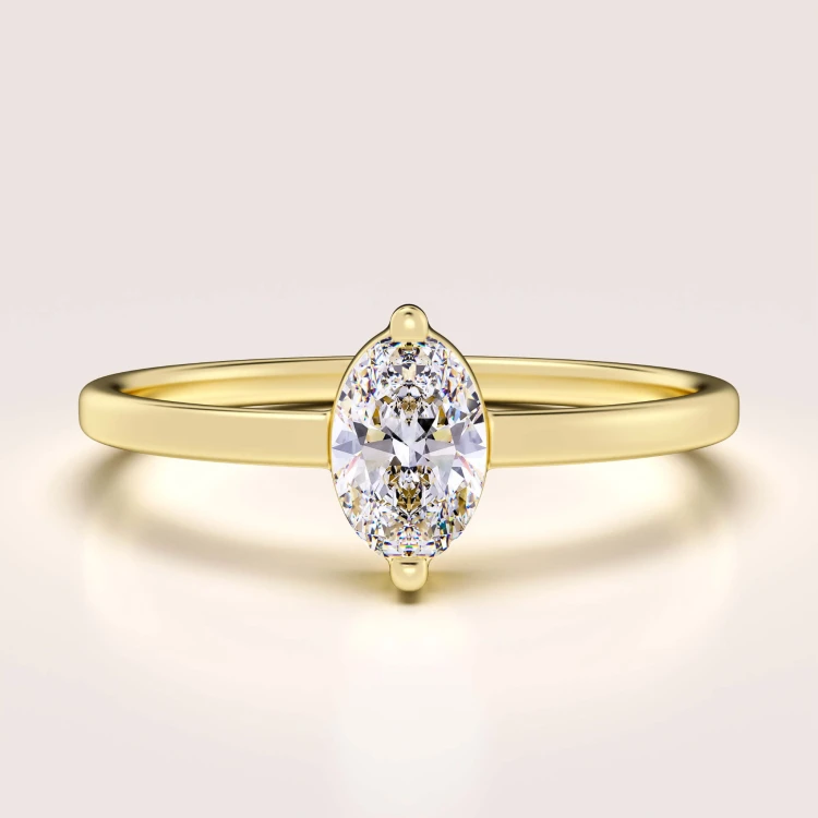 verlobungsring-petit-moissanit-0,5ct-ovalschliff-gelbgold-mystique-hariets.jpg