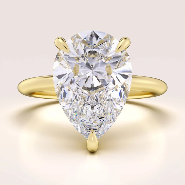 verlobungsring-royal-stones-moissanit-4ct-tropfenschliff-gelbgold-glitare-hariets.jpg