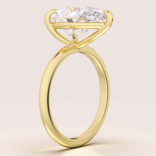 verlobungsring-royal-stones-moissanit-4ct-tropfenschliff-seite-gelbgold-glitare-hariets.jpg