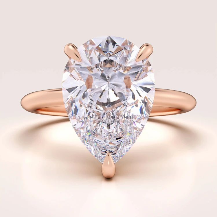 verlobungsring-royal-stones-moissanit-4ct-tropfenschliff-roségold-glitare-hariets.jpg