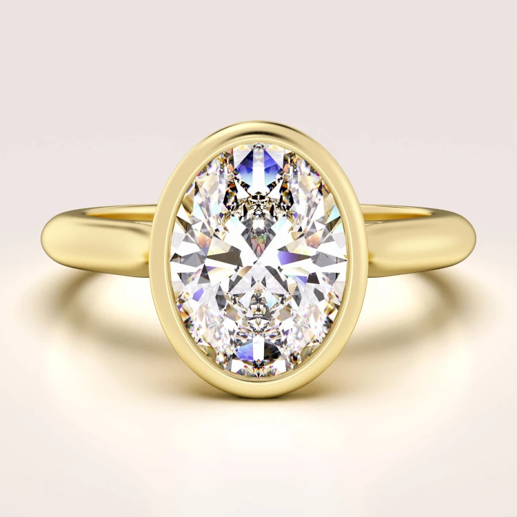 verlobungsring-bezel-moissanit-1-2ct-ovalschliff-gelbgold-amora-hariets.jpg