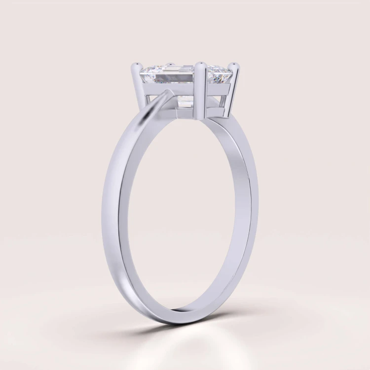 verlobungsring-solitaire-rapture-moissanit-1ct-schliff-smaragd-seitenansicht-silber-hariets.jpg