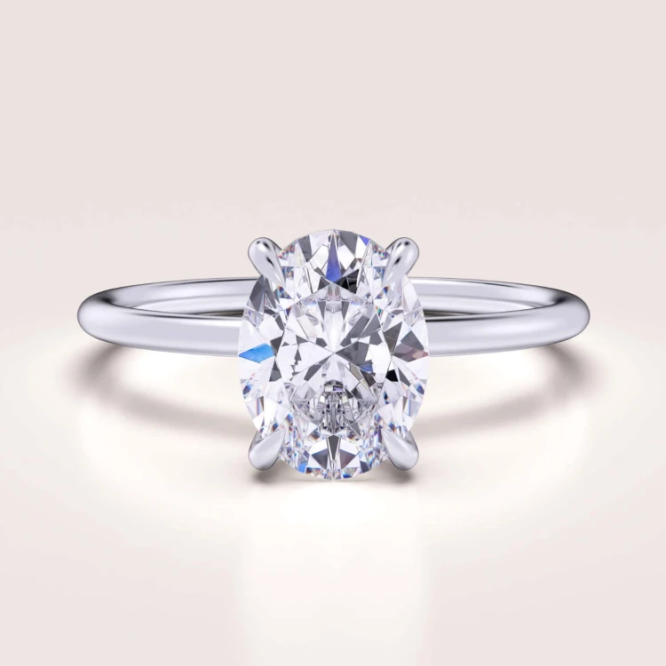 verlobungsring-solitaire-forever-moissanit-1_5ct-ovaler-schliff-weissgold-hariets.jpg