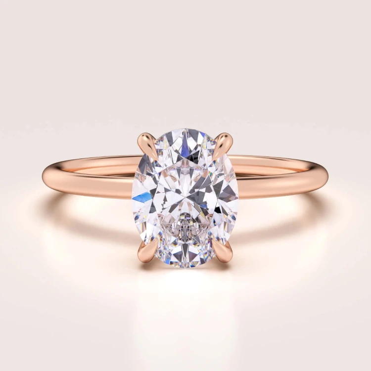 verlobungsring-solitaire-forever-moissanit-1_5ct-ovaler-schliff-rotgold-hariets.jpg