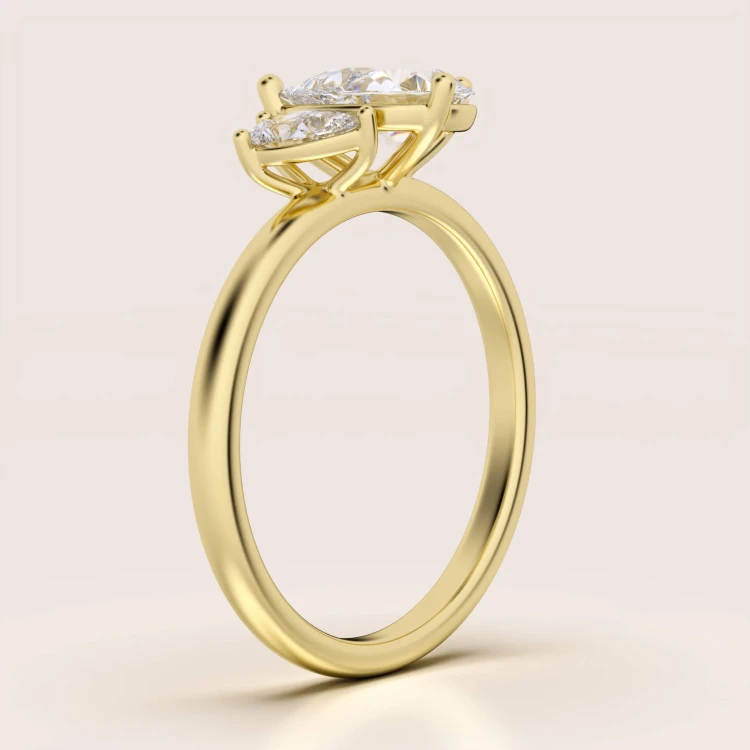 Verlobungsring-Toi-et-Moi-Moissanit-1-6ct-Birnschliff-Seite-Gelbgold-Twin-Pears-Hariets.jpg