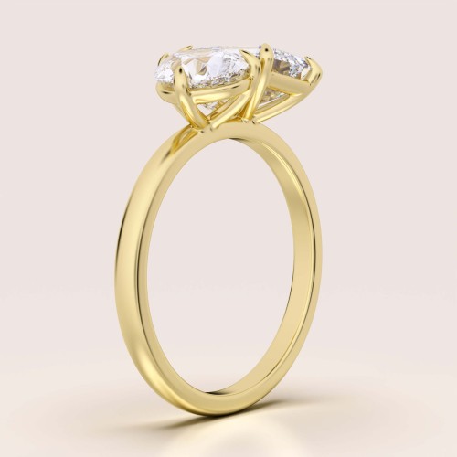 verlobungsring-toi-et-moi-moissanit-3-5ct-emeraldschliff-birnschliff-seite-gelbgold-gemini-hariets.jpg
