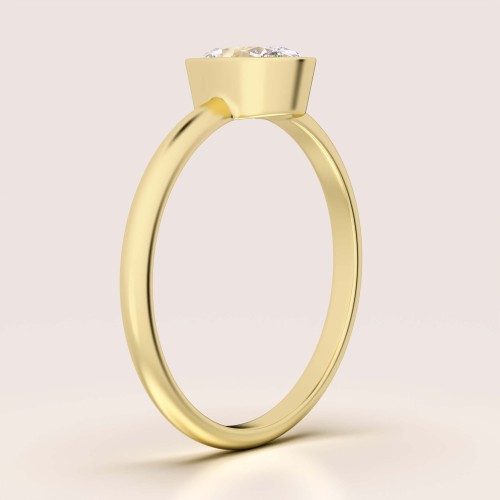 Verlobungsring-Bezel-Moissanit-0,5ct-Ovalschliff-Seitenansicht-Gelbgold-Pure-Hariets.jpg