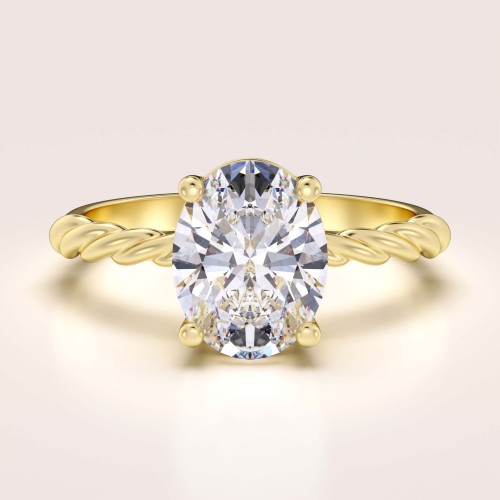 verlobungsring-mit-gedrehtem-ringband-moissanit-2ct-ovalschliff-gelbgold-twisted-hariets.jpg
