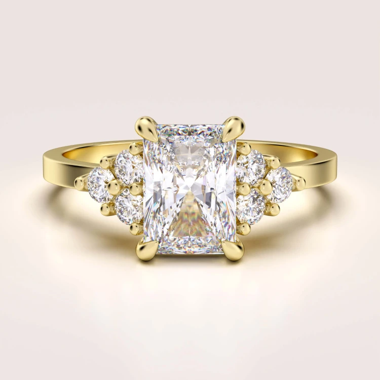 verlobungsring-trinity-moissanit-1ct-radiantschliff-gelbgold-legacy-hariets.jpg