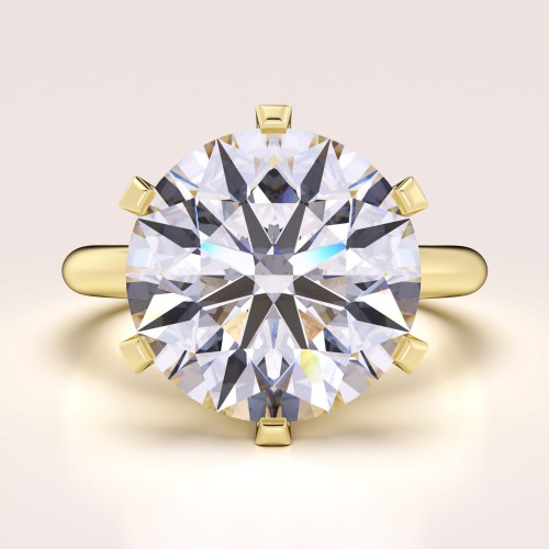 verlobungsring-royal-stones-moissanit-12ct-brillantschliff-gelbgold-queen-hariets.jpg