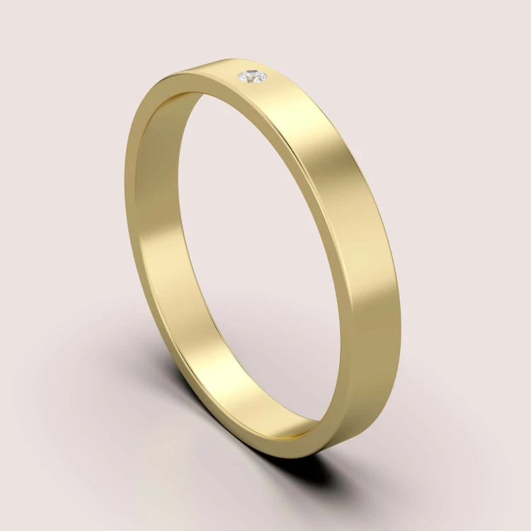 trauring-flach-mit-moissanit-3mm-breite-gelbgold-modern-hariets.jpg