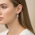 hängende-halo-ohrringe-mit-moissanit-0-5ct-brillantschliff-am-modell-silber-hariets.jpg