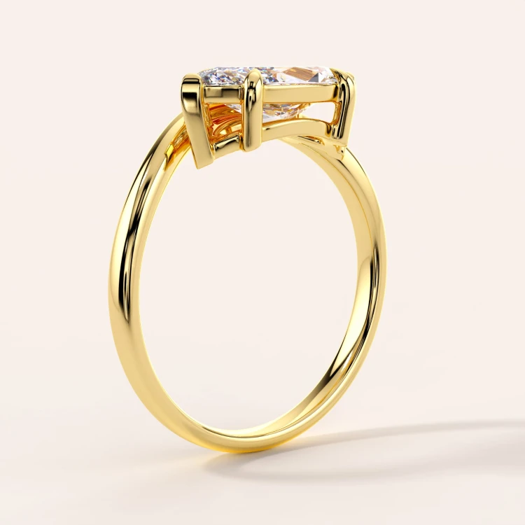 verlobungsring-moissanit-2ct-marquise-schliff-gelbgold-seite-icon-hariets.jpg