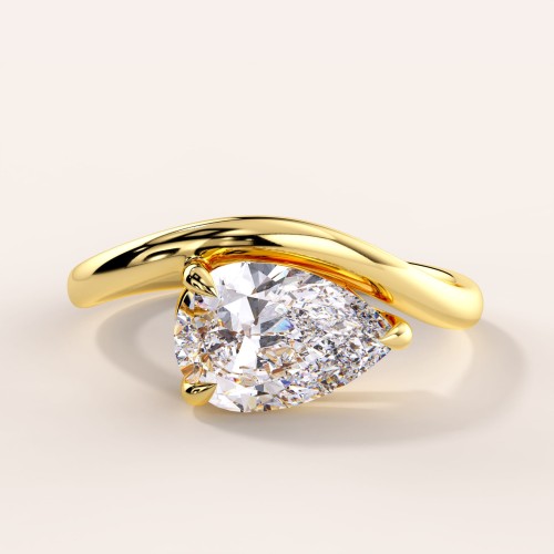 verlobungsring-moissanit-1_5ct-tropfenschliff-gelbgold-icon-hariets.jpg