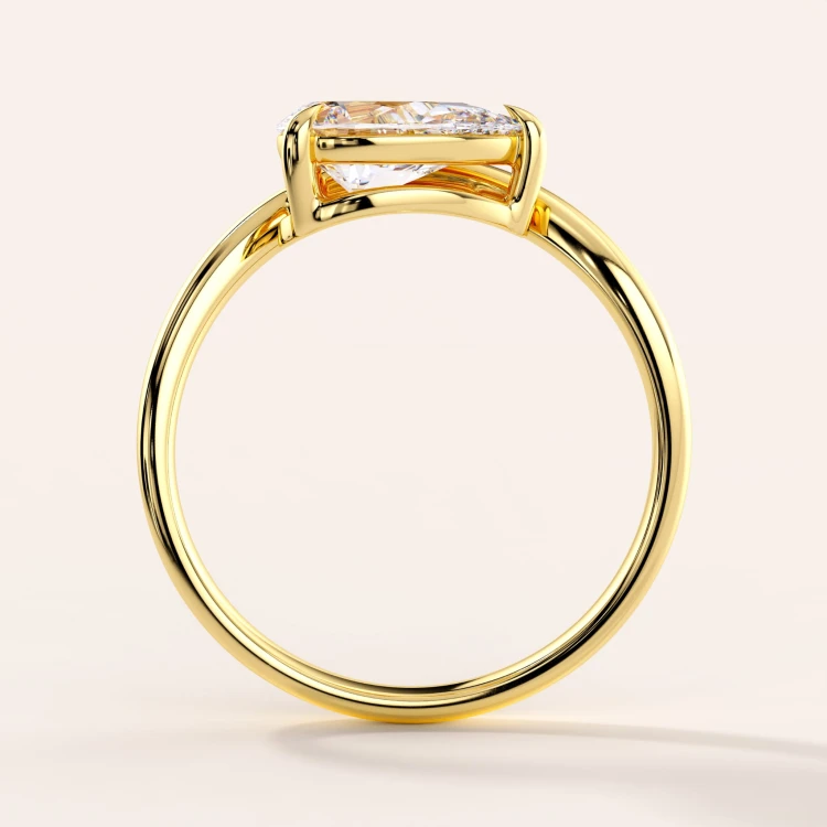 verlobungsring-moissanit-1_5ct-tropfenschliff-gelbgold-front-icon-hariets.jpg