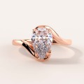 moissanit-ring-1_5ct-tropfenschliff-geschwungene-schiene-roségold-muse-hariets.jpg