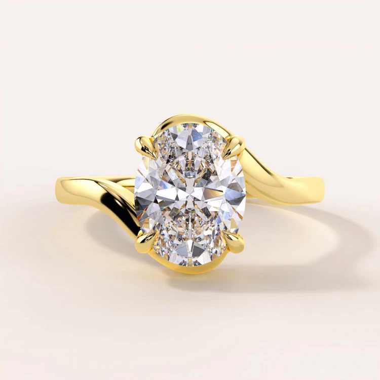 moissanit-ring-2ct-ovalschliff-geschwungene-schiene-gelbgold-muse-hariets.jpg