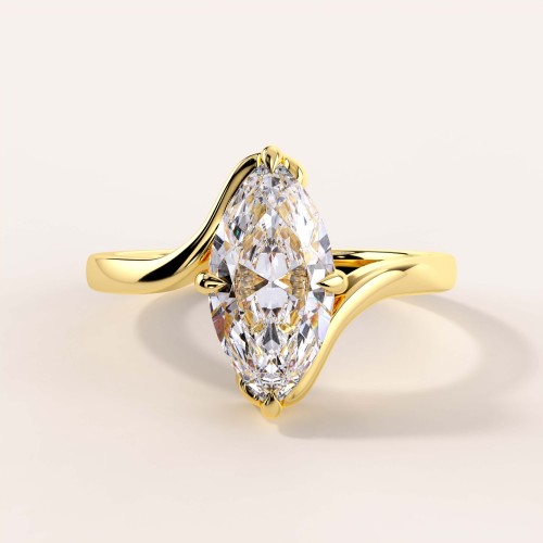moissanit-ring-2ct-marquise-geschwungene-schiene-gelbgold-muse-hariets.jpg