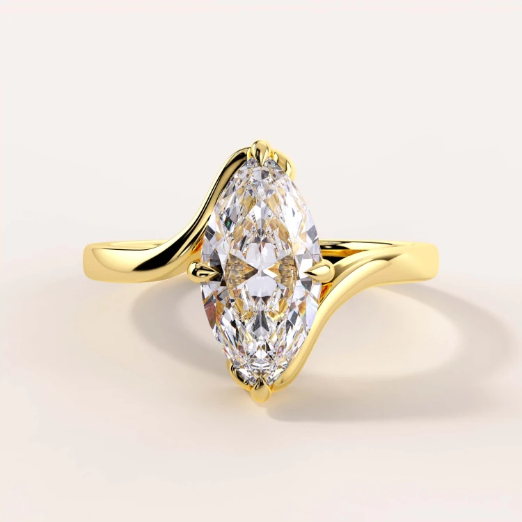 moissanit-ring-2ct-marquise-geschwungene-schiene-gelbgold-muse-hariets.jpg