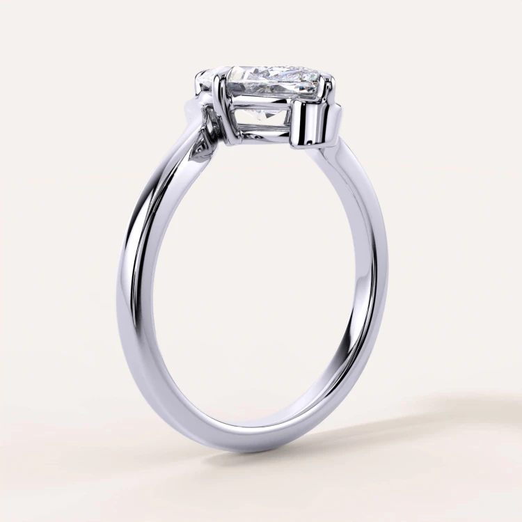 moissanit-ring-2ct-marquise-geschwungene-schiene-seite-weissgold-muse-hariets.jpg