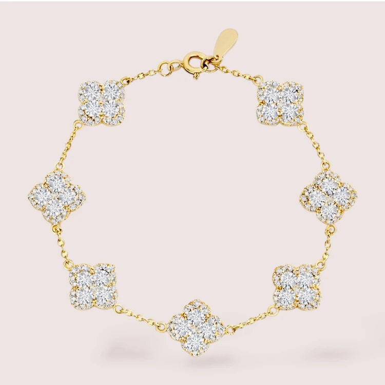 armband-mit-moissanit-kleeblatt-vergoldet-silber-hariets.jpg