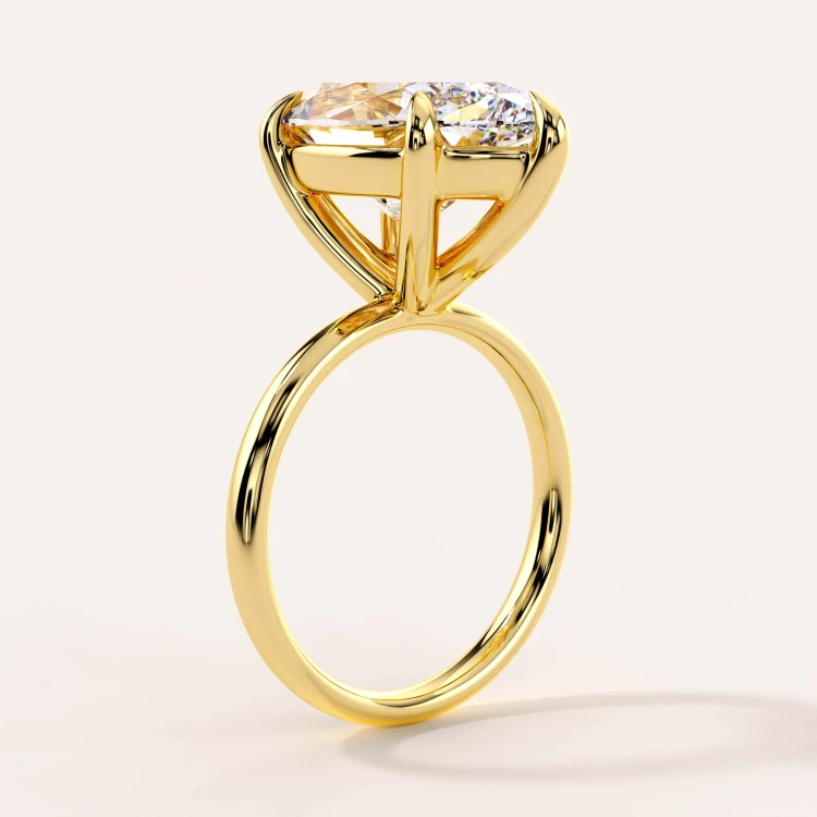 verlobungsring-moissanit-5ct-marquise-schliff-gelbgold-seite-royal-stones-imperia-hariets.jpg