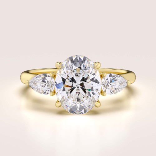 verlobungsring-trinity-seraphina-labordiamant-2ct-zentraler-stein-ovalschliff-gelbgold-hariets.jpg