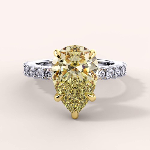 ring-mit-gelbem-diamanten-birnenschliff-gold-julie-hariets.jpg