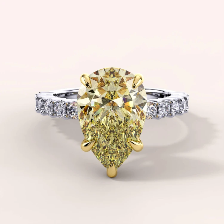 ring-mit-gelbem-diamanten-birnenschliff-gold-julie-hariets.jpg
