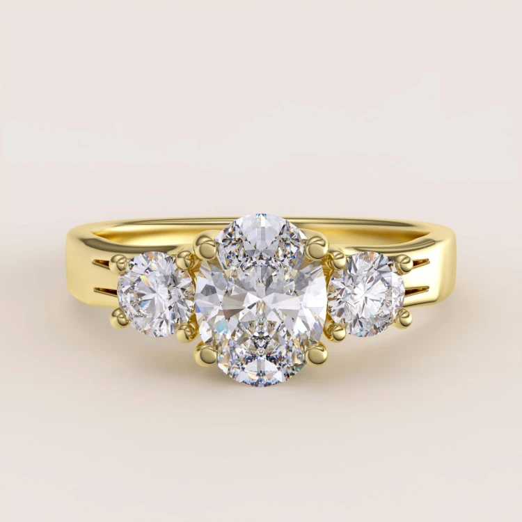 verlobungsring-trinity-mit-moissaniten-ovaler-schliff-1ct-gelbgold-luminance-hariets.jpg
