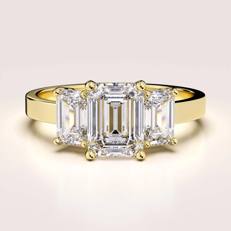 verlobungsring trinity moissanit 3ct smaragdschliff gelbgold envy hariets.jpg