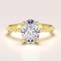 verlobungsring-mit-gedrehtem-ringband-moissanit-2ct-ovalschliff-gelbgold-twisted-hariets.jpg