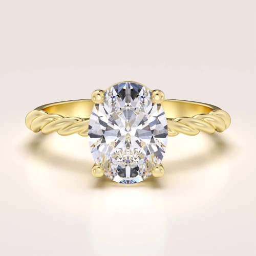 verlobungsring-mit-gedrehtem-ringband-moissanit-2ct-ovalschliff-gelbgold-twisted-hariets.jpg