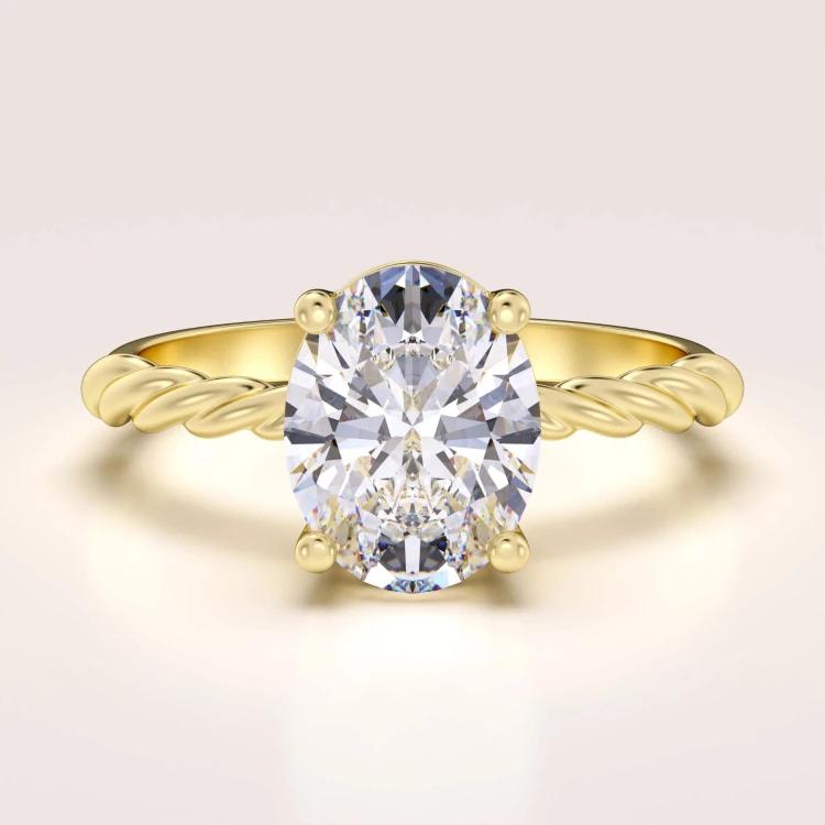 verlobungsring-mit-gedrehtem-ringband-moissanit-2ct-ovalschliff-gelbgold-twisted-hariets.jpg