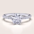 verlobungsring-halo-moissanit-1_5ct-brillantschliff-weißgold-heaven-hariets.png