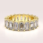 Ehering in 24h Eternity mit Moissaniten im Smaragdschliff, aus 14k Gold