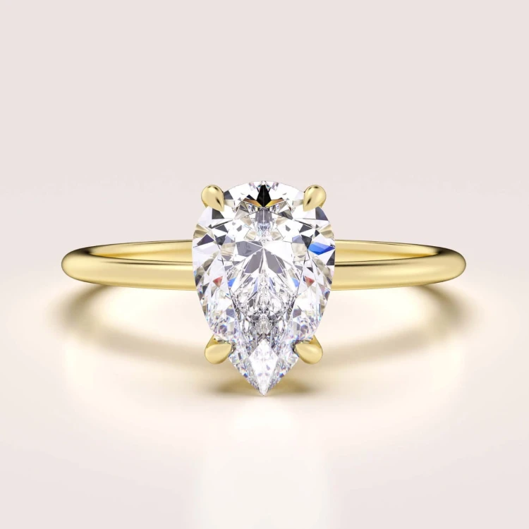 verlobungsring-solitaire-lumiere-moissanit-1-5ct-birnschliff-gelbgold-hariets.jpg