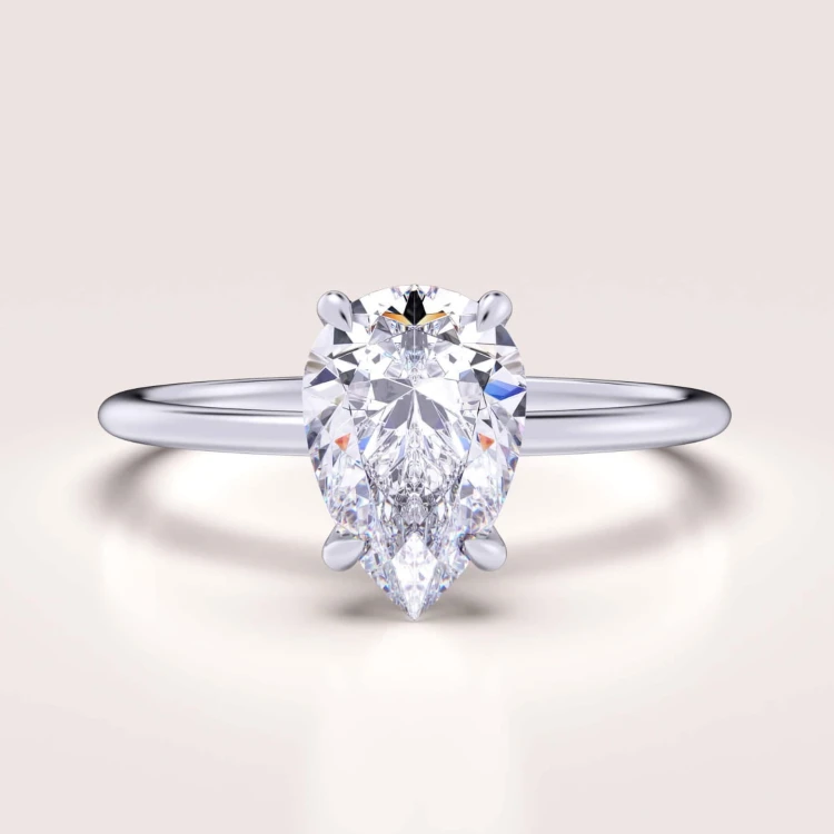 verlobungsring-solitaire-lumiere-moissanit-1-5ct-birnschliff-weissgold-hariets.jpg