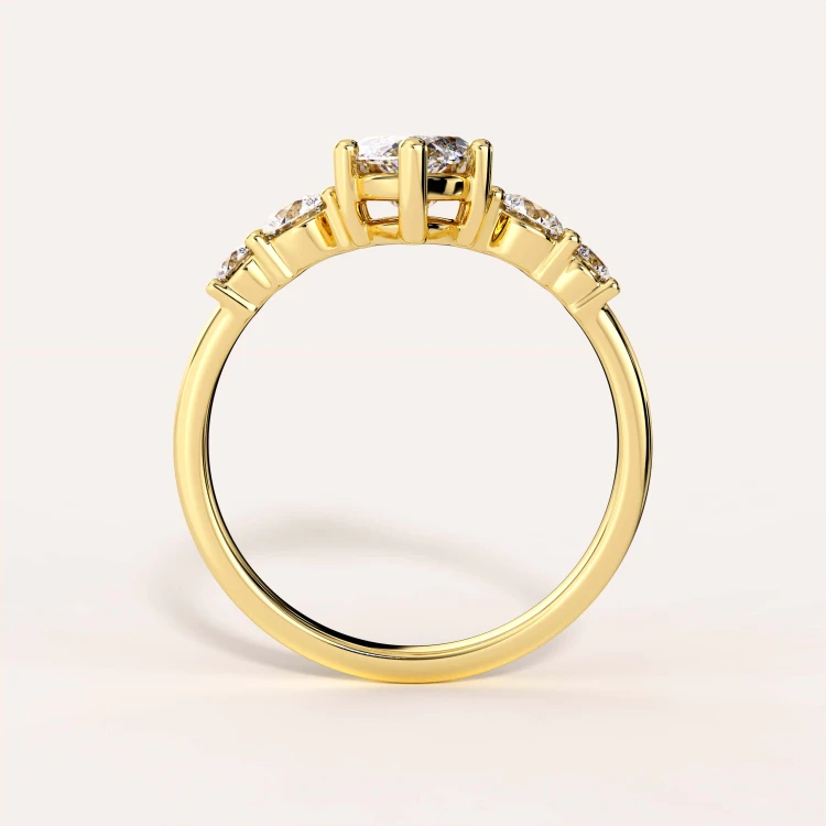 Verlobungsring-Trinity-Moissanit-2ct-Marquiseschliff-Gelbgold-Front-Olympia-Hariets.jpg